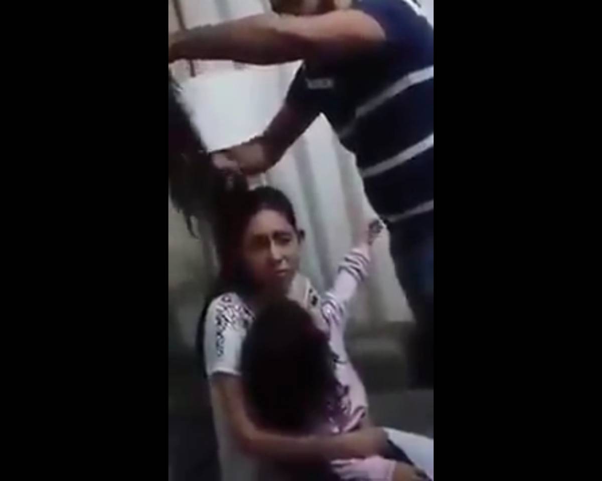 The real story behind the video of husband cutting off wife's hair, abusing