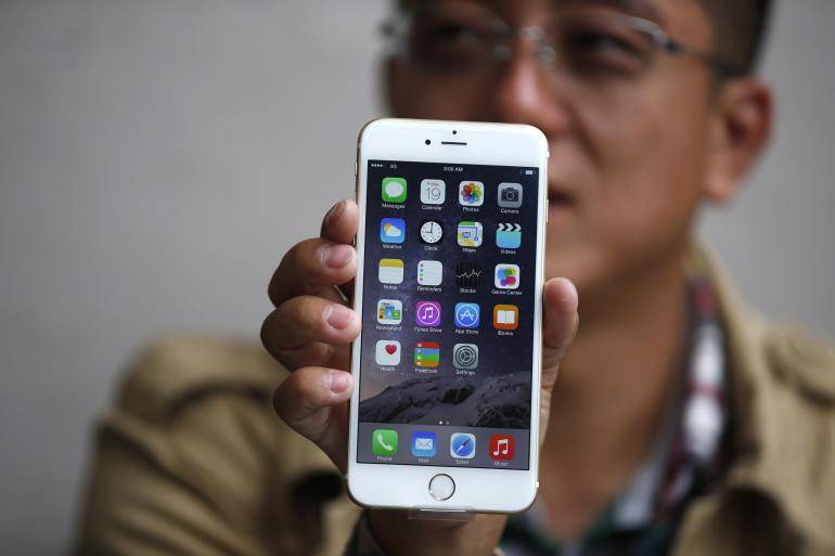 Apple reports record quarterly profit of $18b