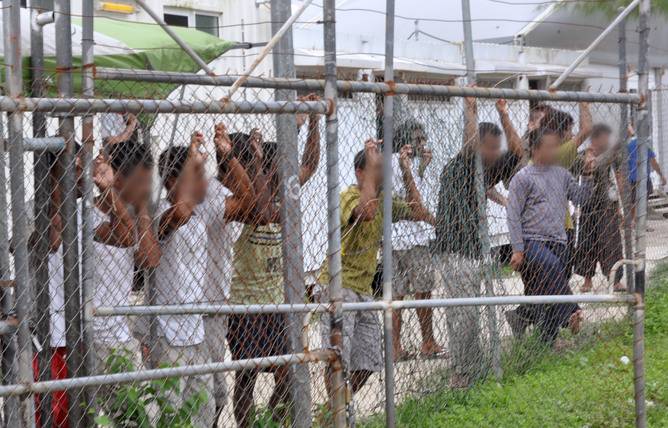 Australia's detention of asylum-seekers at sea ruled legal