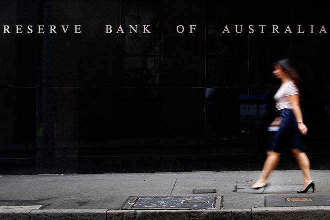 Australia central bank cuts growth, inflation forecasts