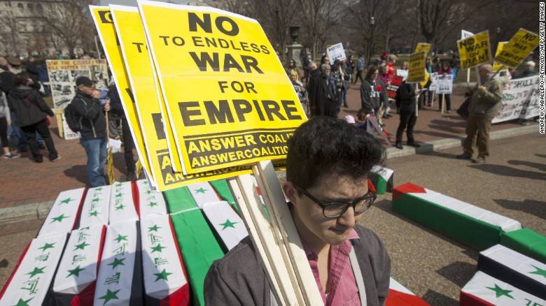 Anti-war protesters drop coffins at White House, Capitol