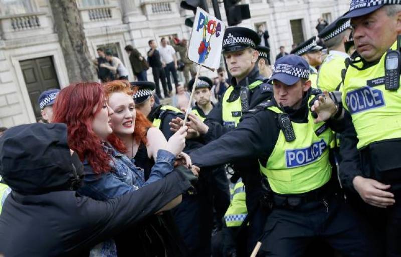 Anti-Cameron protests in London, 17 arrested