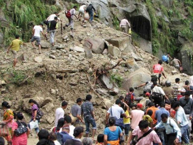 At least 21 dead in landslide in India