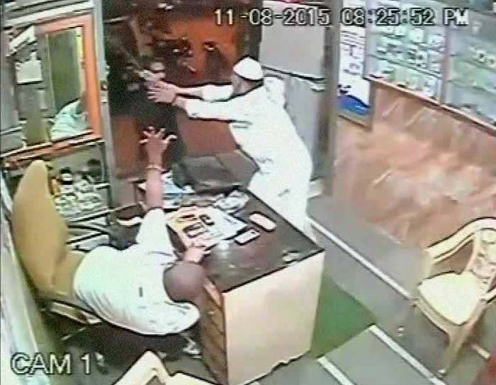 Caught on CCTV: Muslim customer saves disabled Hindu shop owner from a sword attack amid communal riots