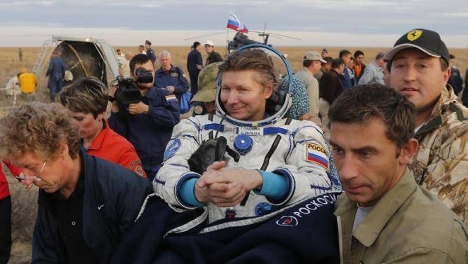 Russian astronaut Padalka back after record 879 days in space