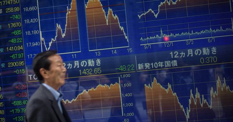 Tokyo shares drop as China economic growth slows further