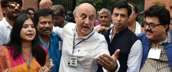 Anupam Kher sorry: Female reporter 'called prostitute' at India’s tolerance rally