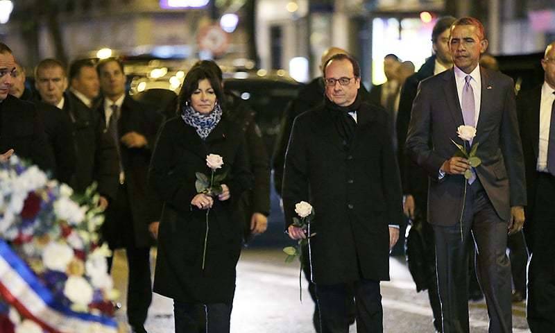 Obama visits Paris attacks site, pays tribute to victims