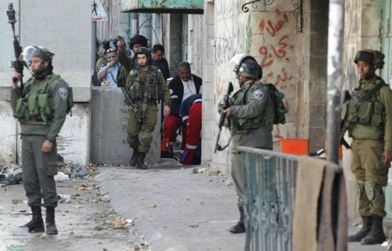Palestinian woman shot trying to stab Israeli troops