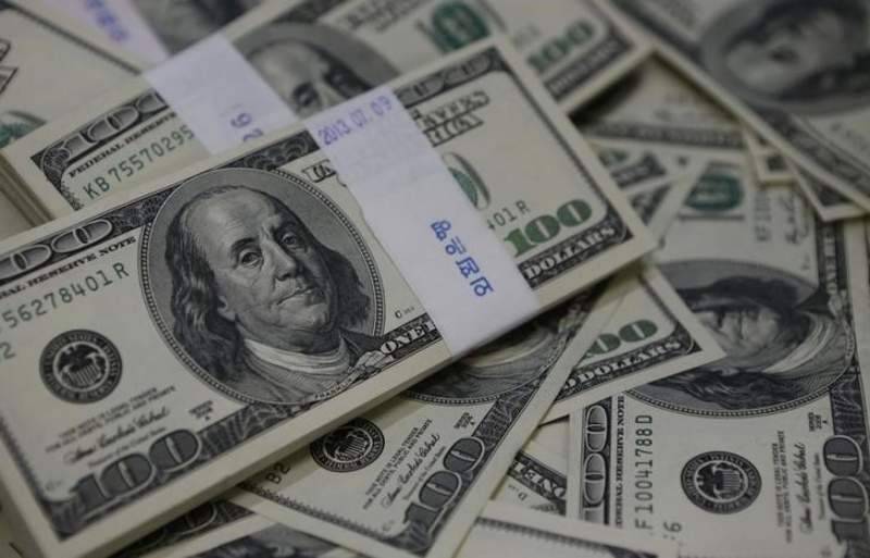 Dollar up as bright US data opens door to rate hike