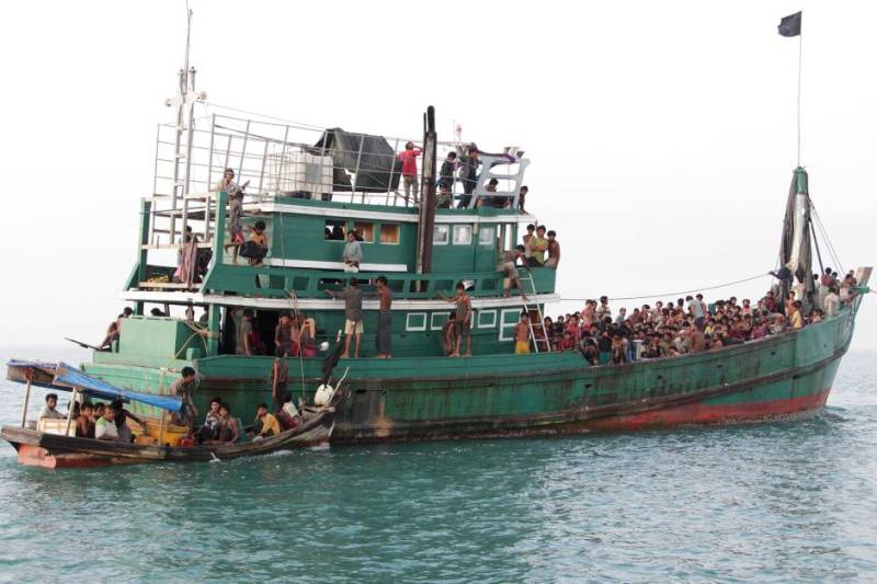 Australia turns back three asylum-seeker boats