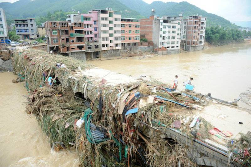 Tropical storm leaves 69 dead, dozens missing in China