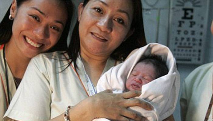 Baby girl born mid-air on flight to Philippines