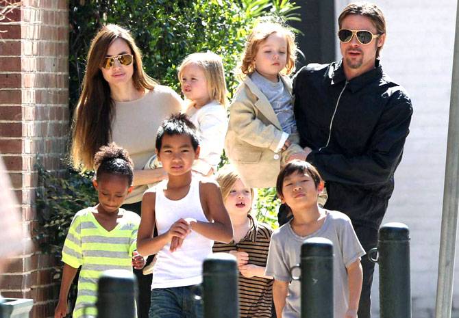 Angelina Jolie has her first New Year's celebration in a long time WITHOUT Brad Pitt