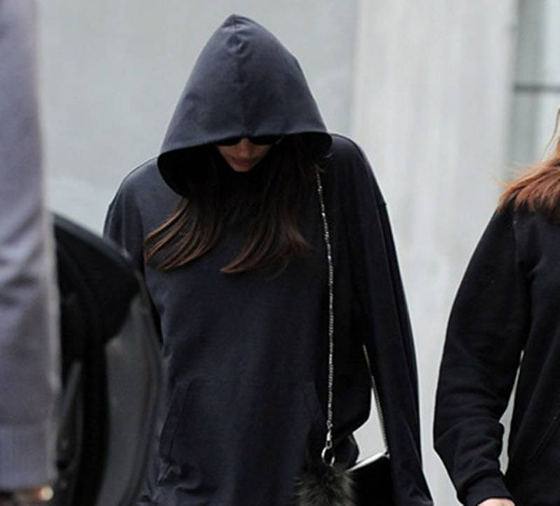 Is Bradley Cooper the dad? Irina Shayk covers baby bump behind large hoodie