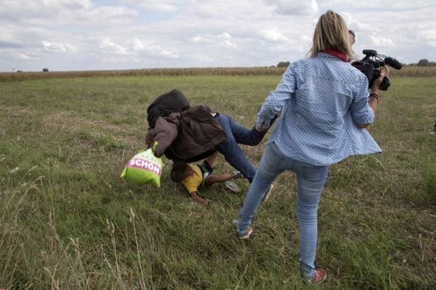 Hungarian camerawoman who kicked migrants sentenced