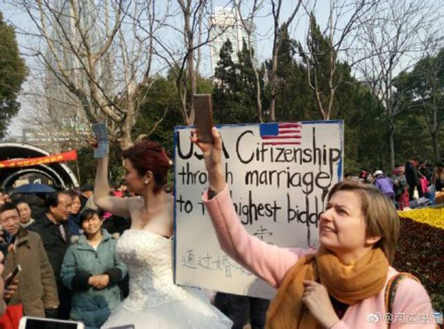 American woman dressed as bride offers US citizenship through marriage