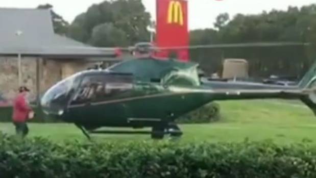 Hungry pilot shuns hanger as he lands helicopter next to fast food chain