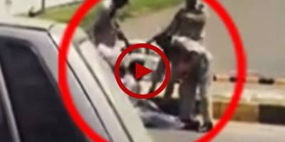 Watch how a group of traffic wardens roughs up citizen in Islamabad