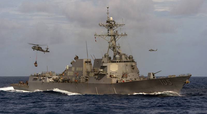 China Navy warns US warship to leave disputed waters in S. China Sea