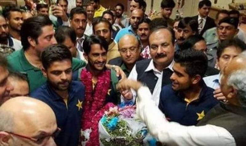 Triumphant Pakistan team returns home with Champions Trophy