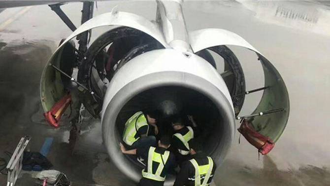 Chinese passenger throws coin at plane's engine to pray for safety