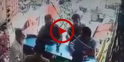 CCTV footage of robbery at mobile shop in Karachi