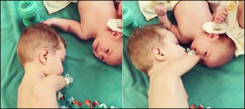 Worth watching: Toddler born without lower arms comforts crying baby