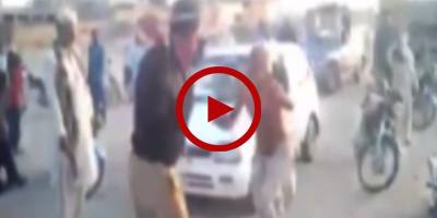 Policeman brutally beating old man in Rahim Yar Khan