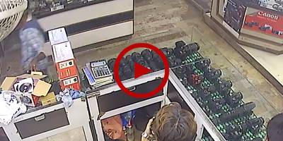 CCTV footage shows boy getting away with mobile phone from shop