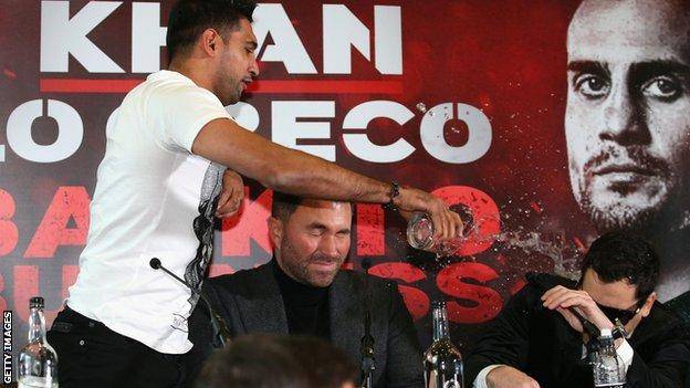 VIDEO: Amir Khan hurls a glass of water at Canadian boxer in heated exchange about personal life