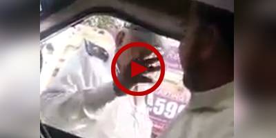 Traffic cop caught on tape demanding bribe from driver in Karachi