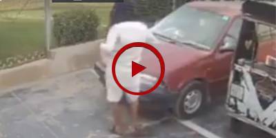 Robber gets away with car battery in under 30 seconds (VIDEO)