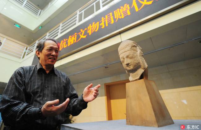 Stolen 1,500-yr-old statue head returns to China