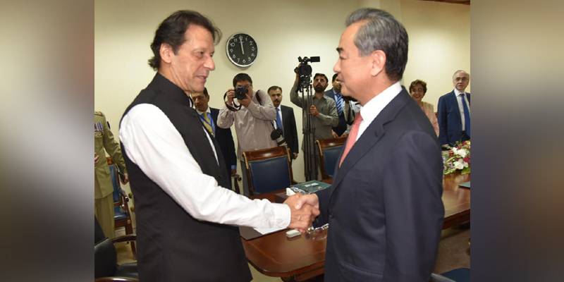 Friendship with China cornerstone of Pakistan’s foreign policy, PM Imran to FM Wang Yi