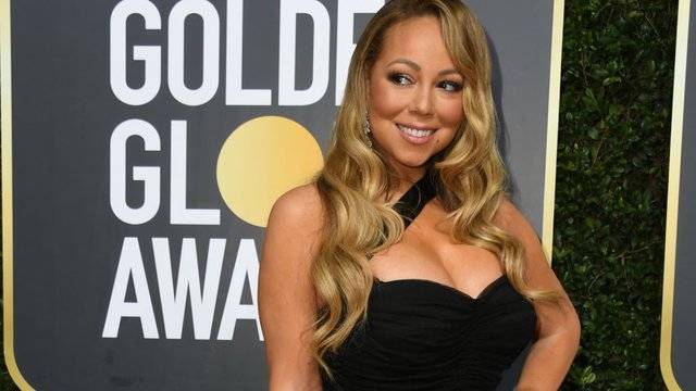 Mariah Carey opens bottle without touching it and wow