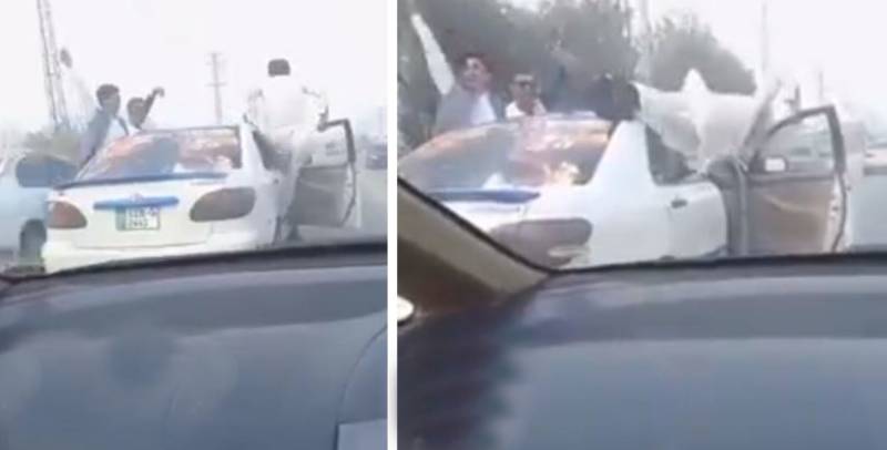 Push-ups stunt atop moving car lands Mardan man in jail (VIDEO)
