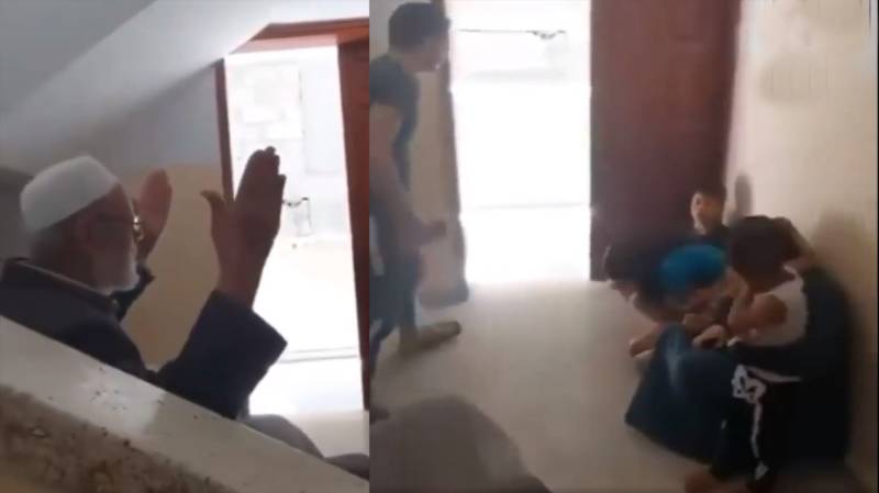 WATCH - Palestinian family escape unharmed while praying amid Israeli bombardment