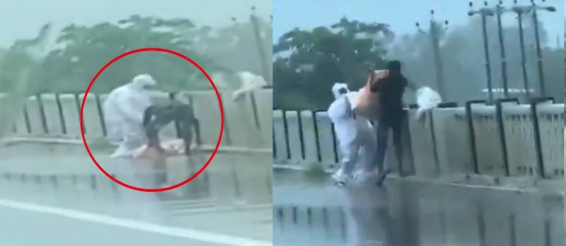 Disturbing video emerges of Covid patient's dead body dumped off bridge in Indian state