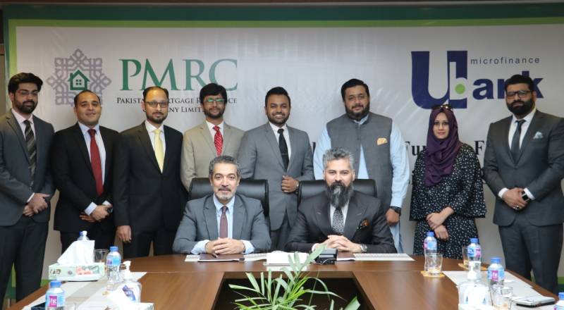 U Microfinance Bank signs MoU with PMRC for affordable housing finance