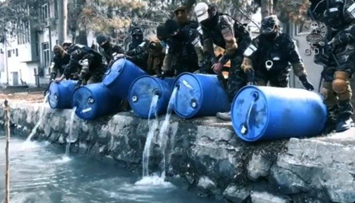 Afghan officials throw thousands of litres of liquor into Kabul canal