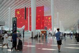 Tourists head to China as borders reopened after three years 