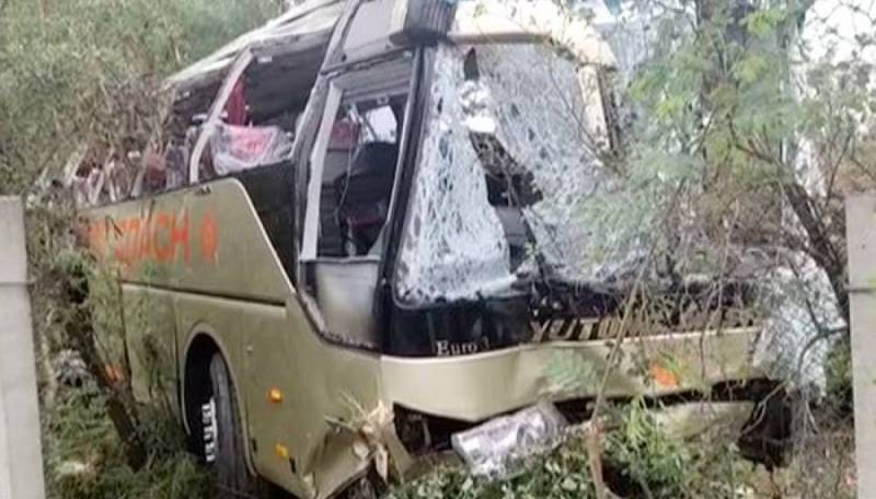 At least 14 killed, scores injured as speeding coach turns turtle near Kallar Kahar