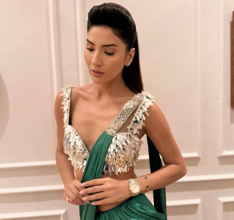 Kiran Malik dazzles in emerald green saree