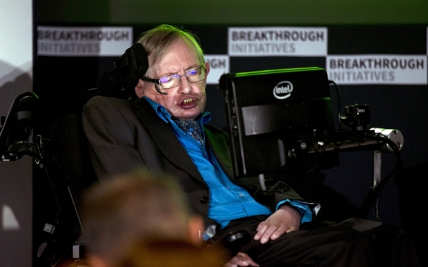 Renowned physicist Stephen Hawking attends a press conference in London, Monday, July 20, 2015. Renowned physicist Stephen Hawking and Russian tech entrepreneur Yuri Milner are pushing the search for extraterrestrial life into higher gear. The pair said Monday the $100 million 