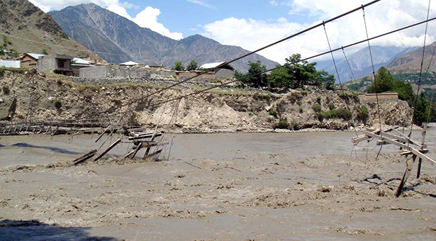 APP11-21 CHITRAL: July 21 – A view of a broken suspension bridge over River Chitral due to a flash flood affected badly the remote areas of the district. APP photo by Gul Hammad Farooqi