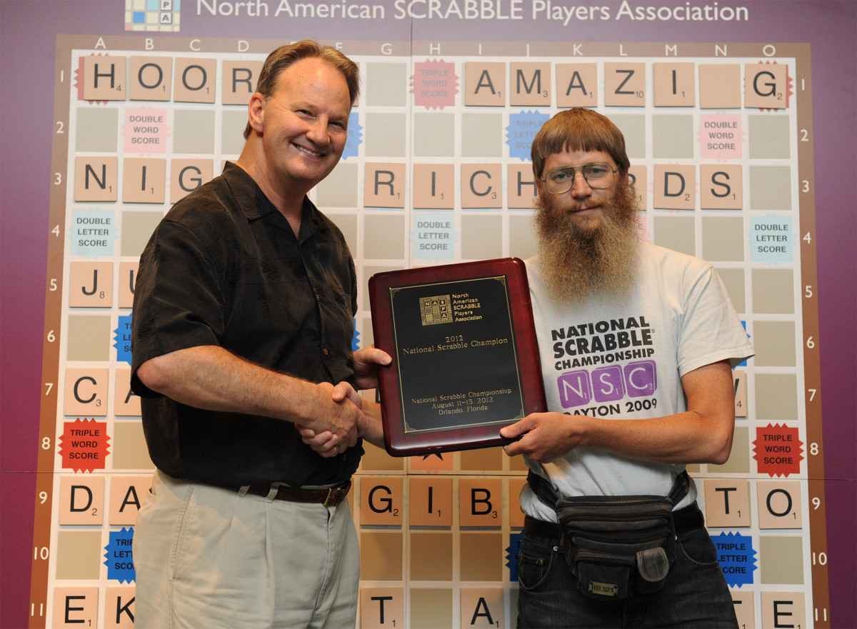 Nigel Richards (right) with Chris Cree, co-president of North American SCRABBLE Players Association, became the only person to win four National SCRABBLE Championships as well as win three titles in a row. As the 2012 National SCRABBLE Champion Nigel won the top $10,000 prize. (PRNewsFoto/National SCRABBLE(R) Championship) THIS CONTENT IS PROVIDED BY PRNewsfoto and is for EDITORIAL USE ONLY**