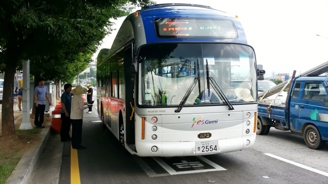 An electric city bus in Gumi, South Korea, is part of a program using electromagnetic fields to charge batteries of electric vehicles.