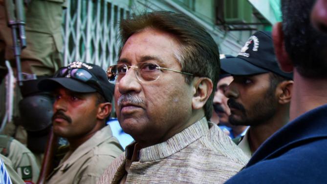 FILE - In this Saturday, April 20, 2013 file photo, Pakistan's former President and military ruler Pervez Musharraf arrives at an anti-terrorism court in Islamabad, Pakistan. A court on Monday, Jan. 18, 2016 has acquitted Musharraf from murder case involving the killing of a nationalist leader, Akbar Bugti, who had died in a military operation. (AP Photo/Anjum Naveed, File)