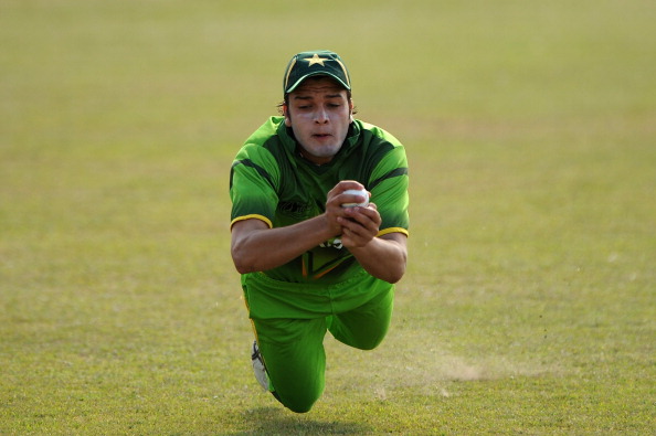 TOWNSVILLE, AUSTRALIA - AUGUST 22: Usman Qadir of Pakistan dives for a catch during the ICC U19 Cricket World Cup 2012 Semi Final match between Pakistan and the West Indies at Endeavour Park on August 22, 2012 in Townsville, Australia. (Photo by Matt Roberts-ICC/Getty Images)